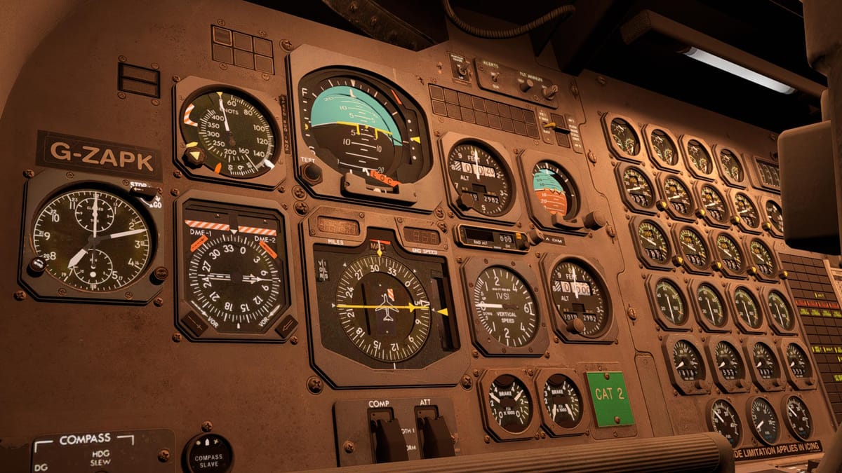 A close-up angled shot of a retro aircraft's main instrument panel, illuminated at night.