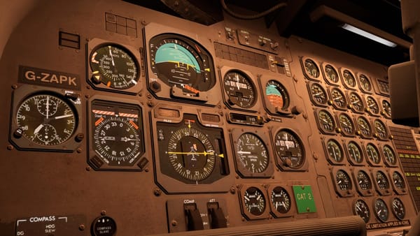 A close-up angled shot of a retro aircraft's main instrument panel, illuminated at night.